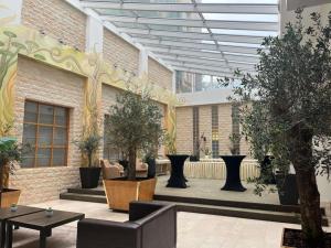 Κήπος έξω από το Hotel des Colonies Brussels by Mercure