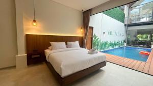 Bazén v ubytování Villa Alba Uno Heated Pool Lembang Bandung nebo v jeho okolí