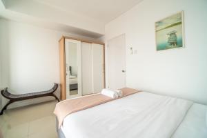 Ένα ή περισσότερα κρεβάτια σε δωμάτιο στο 1-Bedroom above mall thamrin city, Central Jakarta, SCBD +26 φωτογραφίες