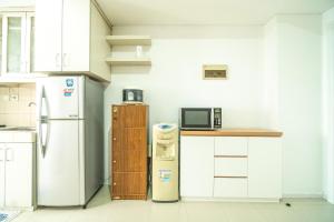 Η κουζίνα ή μικρή κουζίνα στο 1-Bedroom above mall thamrin city, Central Jakarta, SCBD