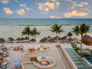 an aerial view of a resort with the ocean at Fairmont Mayakoba in Playa del Carmen