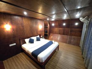 Postel nebo postele na pokoji v ubytování Woodshade resort