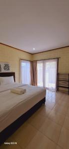 Giường trong phòng chung tại Lantiscorp