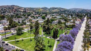 an aerial view of a city with trees and purple flowers at Mi Casita-Bungalow Vacation Home in Whittier