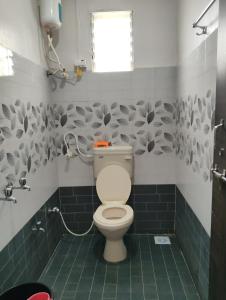 Koupelna v ubytování Gurukrupa Homestay, Pandharpur