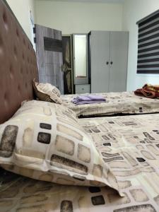 Ένα ή περισσότερα κρεβάτια σε δωμάτιο στο SVR home stays