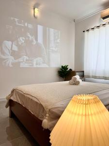 Ένα ή περισσότερα κρεβάτια σε δωμάτιο στο Rù Rì Homestay