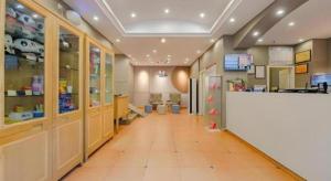 a pharmacy aisle with a counter in a store at Home Inn Hotel Chengdu Gaoshengqiao Subway Station in Chengdu