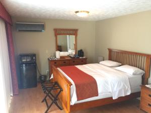 Ένα ή περισσότερα κρεβάτια σε δωμάτιο στο Grey Rose Suites