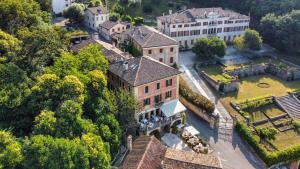 an aerial view of a building in a city at Albergo Al Sole in Asolo