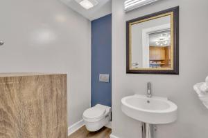 a bathroom with a sink and a toilet at Savannah Skyline in Savannah +28 photos