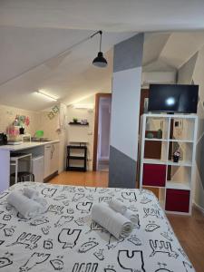a room with a bed with two pillows on it at CANTUCCIO nel Verde in Avellino