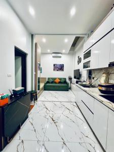 Η κουζίνα ή μικρή κουζίνα στο Phương house