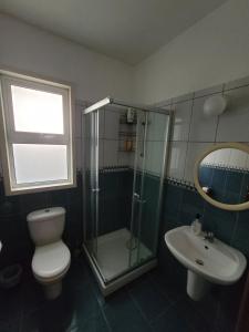 Koupelna v ubytování Kalampakas Guesthouse