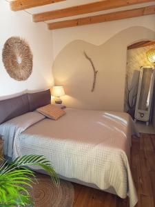 a bedroom with a bed in a room at Briciole di Pietra B&B in Dolceacqua