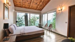 Postel nebo postele na pokoji v ubytování Blue Pine Mountain Homes