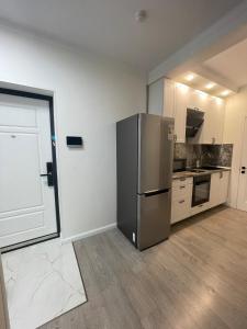 Kuchyň nebo kuchyňský kout v ubytování Mega + 14 fotografií