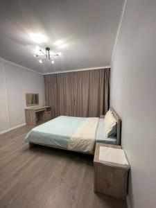 Postel nebo postele na pokoji v ubytování Mega