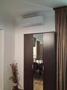 a room with a door and a mirror and a room at Casa Dora in Sovata +79 photos