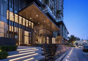 a building with stairs in front of it at CASA by Meridian in Phnom Penh