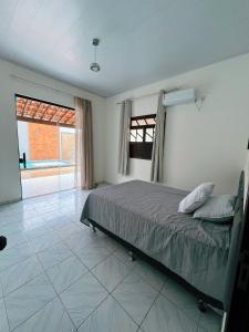 Postel nebo postele na pokoji v ubytování Recanto verano