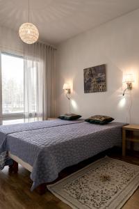 Ένα ή περισσότερα κρεβάτια σε δωμάτιο στο Meritähti 104