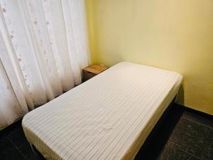 Ένα ή περισσότερα κρεβάτια σε δωμάτιο στο Beautiful Entire House +10 φωτογραφίες