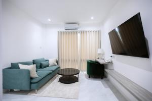 TV a/nebo společenská místnost v ubytování Tree Airport Hotel Hatyai