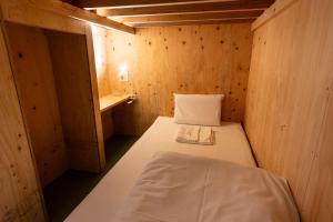 Postel nebo postele na pokoji v ubytování Mezame Hostel