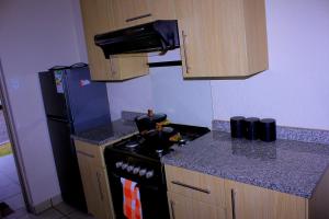 Kuchyň nebo kuchyňský kout v ubytování Cozy studio