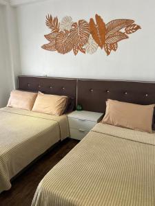 Postel nebo postele na pokoji v ubytování City View 2 Room Apartment