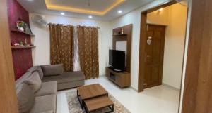 Μια τηλεόραση ή/και κέντρο ψυχαγωγίας στο Peaceful Village Retreat in the City-Lavender Villa