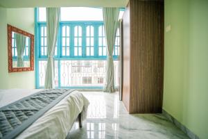 Postel nebo postele na pokoji v ubytování The Salty Soul A cozy Two Bedroom apartment