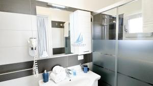 Koupelna v ubytování AQUARAMA Rooms & Apartments