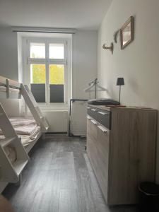 Postel nebo postele na pokoji v ubytování Ferienwohnung GRETA Allee34