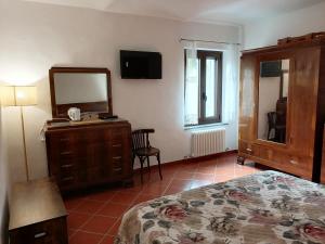 Postel nebo postele na pokoji v ubytování Cascina Frati