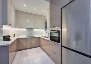 Kuchyň nebo kuchyňský kout v ubytování Athens Riviera City Escape