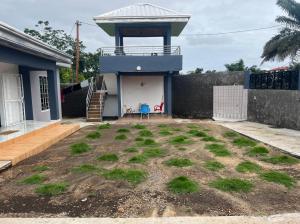 Un jardín fuera de Appartement meublé