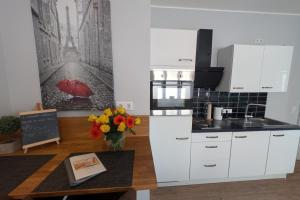 Kuchyň nebo kuchyňský kout v ubytování Moderne Apartments Bedburg-Hau