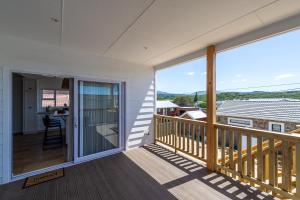 a view from the balcony of a house at The White House - Kleinkrantz in Wilderness