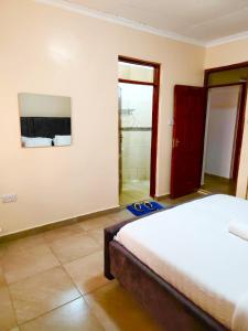 TV a/nebo společenská místnost v ubytování Conystar Homes Eldoret