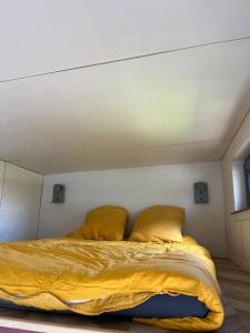 Postel nebo postele na pokoji v ubytování Tiny House