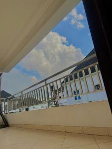 a view of a large building with a large window at Share with Jayz in Lekki +8 photos