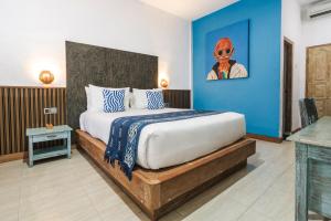 Voodi või voodid majutusasutuse Sanur House toas +45 fotot