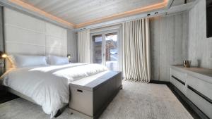 Ένα ή περισσότερα κρεβάτια σε δωμάτιο στο Chalet Crystal