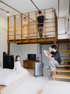 a group of people standing in a bunk bed at Makai NAP, Thaimueang in Ban Lam Pi +33 photos