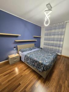 Postel nebo postele na pokoji v ubytování Giulia's Penthouse
