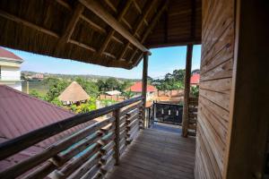 a view from the balcony of a house at Rustic cabin in Masaka