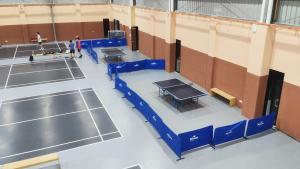 an overhead view of a tennis court with two tables at Unisuites Kampar Studio 5 min to UTAR TARC -3pax , 1 CP in Kampar