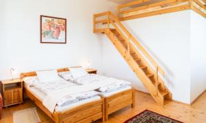 Postel nebo postele na pokoji v ubytování Kraselovský Dvůr + 46 fotografií